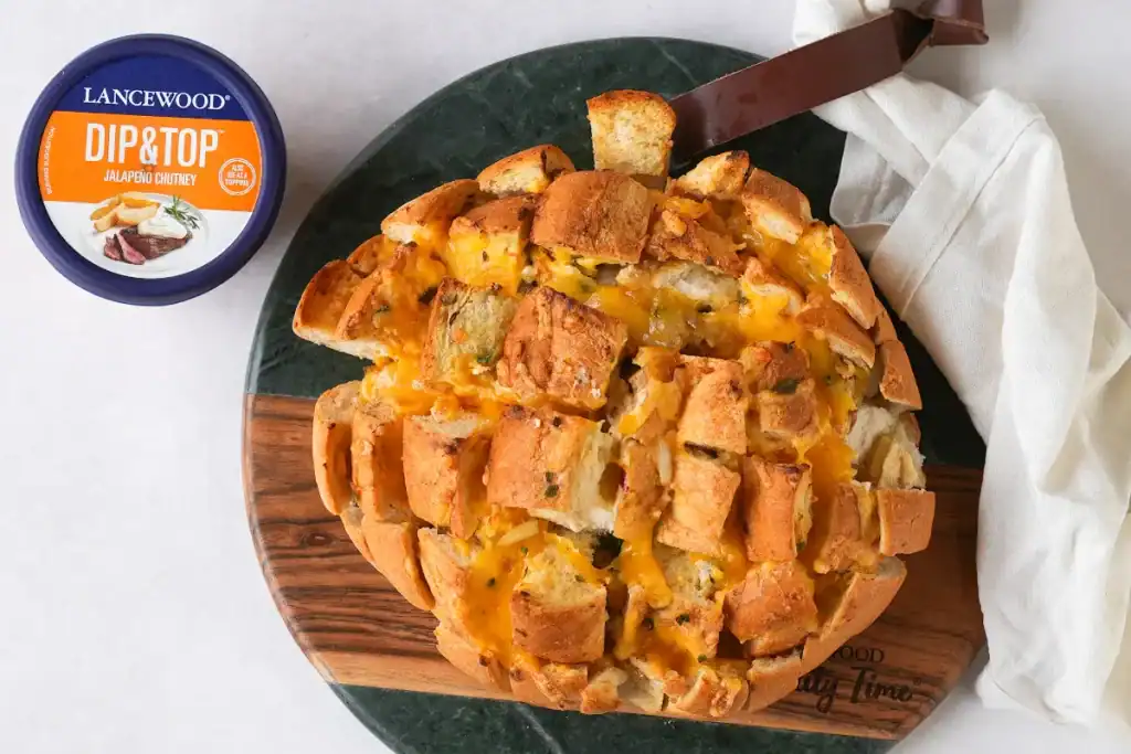 The Ultimate Heritage Day Food Guide: Stuffed cheesy boerewors bread baked golden brown – a festive Heritage Day boerewors recipe