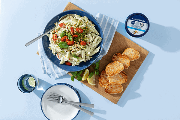 Celebrate World Pasta Day with these 10 irresistible recipes Creamy chicken pesto pasta salad with cherry tomatoes and basil, one of the best pasta salad recipes for braai gathering