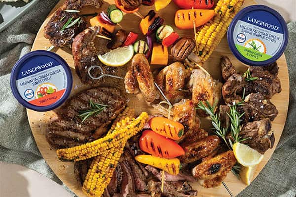 The Ultimate Heritage Day Food Guide: Heritage Day meat platter ideas with grilled lamb chops, chicken wings, veggies and Lancewood cream cheese dips