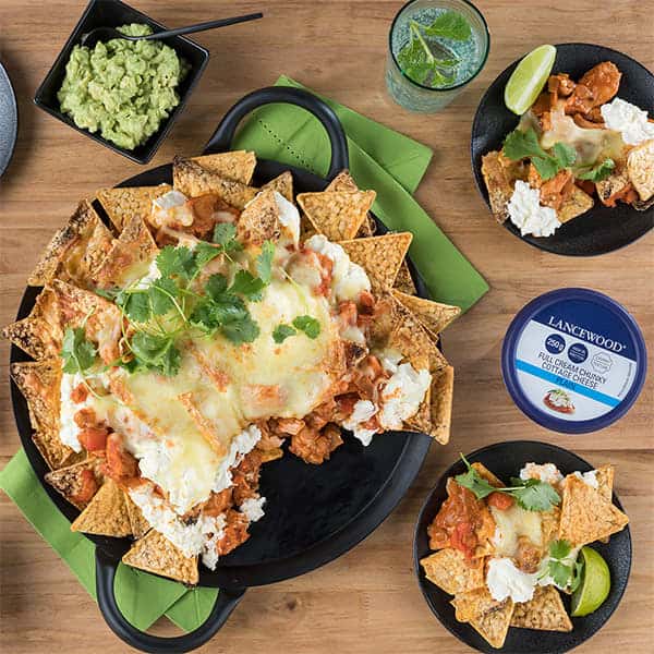 Top 10 Cottage Cheese Recipes: Delicious High-Protein Meals Cheesy chicken nachos with LANCEWOOD® cottage cheese, perfect for snack platter ideas South Africa
