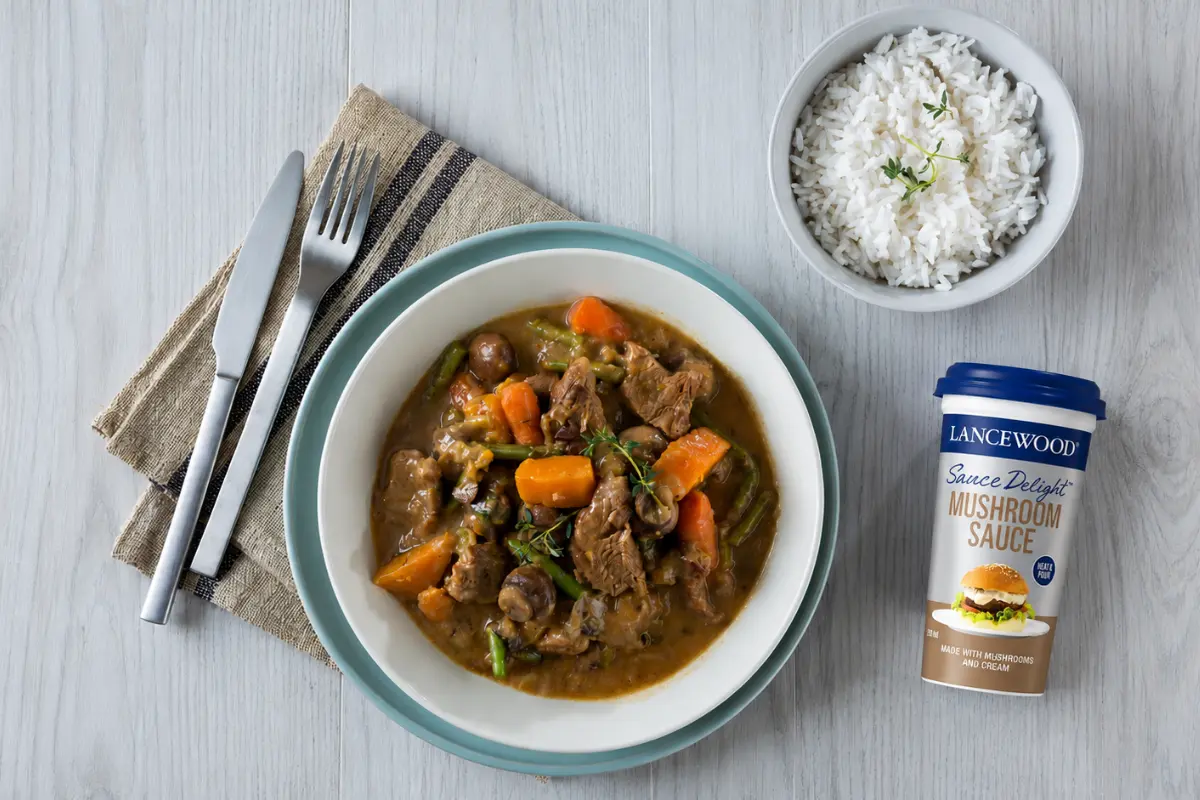 Hearty mushroom beef stew with rice and Lancewood Mushroom Sauce
