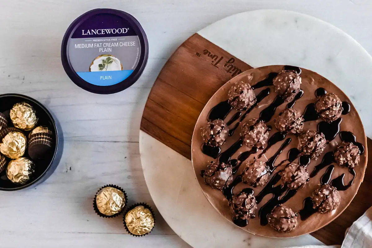 9 Decadent Winter Dessert Recipes and 1 Savoury Cheesecake Twist No-bake chocolate-hazelnut cheesecake topped with Ferrero Rocher chocolates