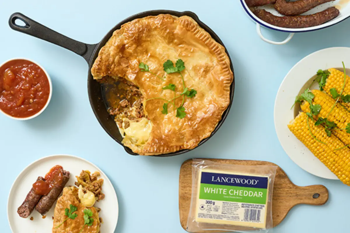 Spicy Lamb Keema Braai Pie with LANCEWOOD® White Cheddar, sausages, corn and tomato relish
