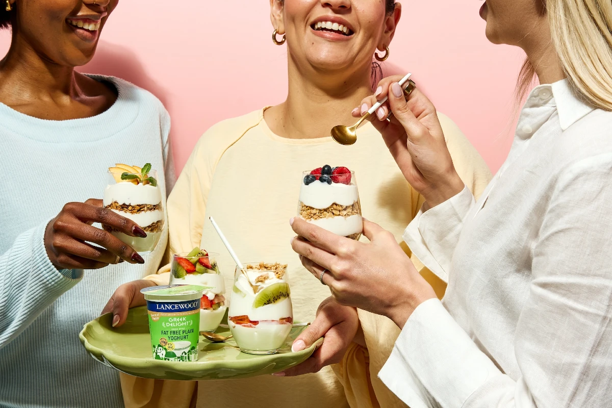 3 Women enjoying Girl's breakfast parfait made with LANCEWOOD® Yoghurt